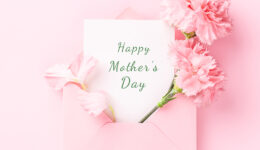 Happy Mother's Day card in pink envelope.